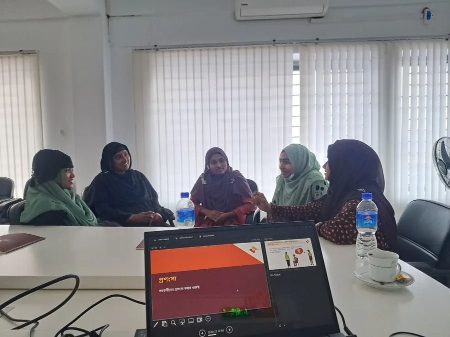 Small-group worker counselling session at a Bangladesh garment factory
