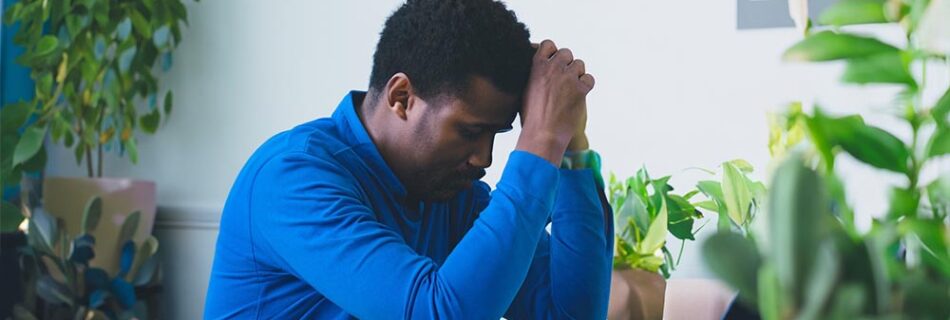 a depressed man tired of list of mental health issues