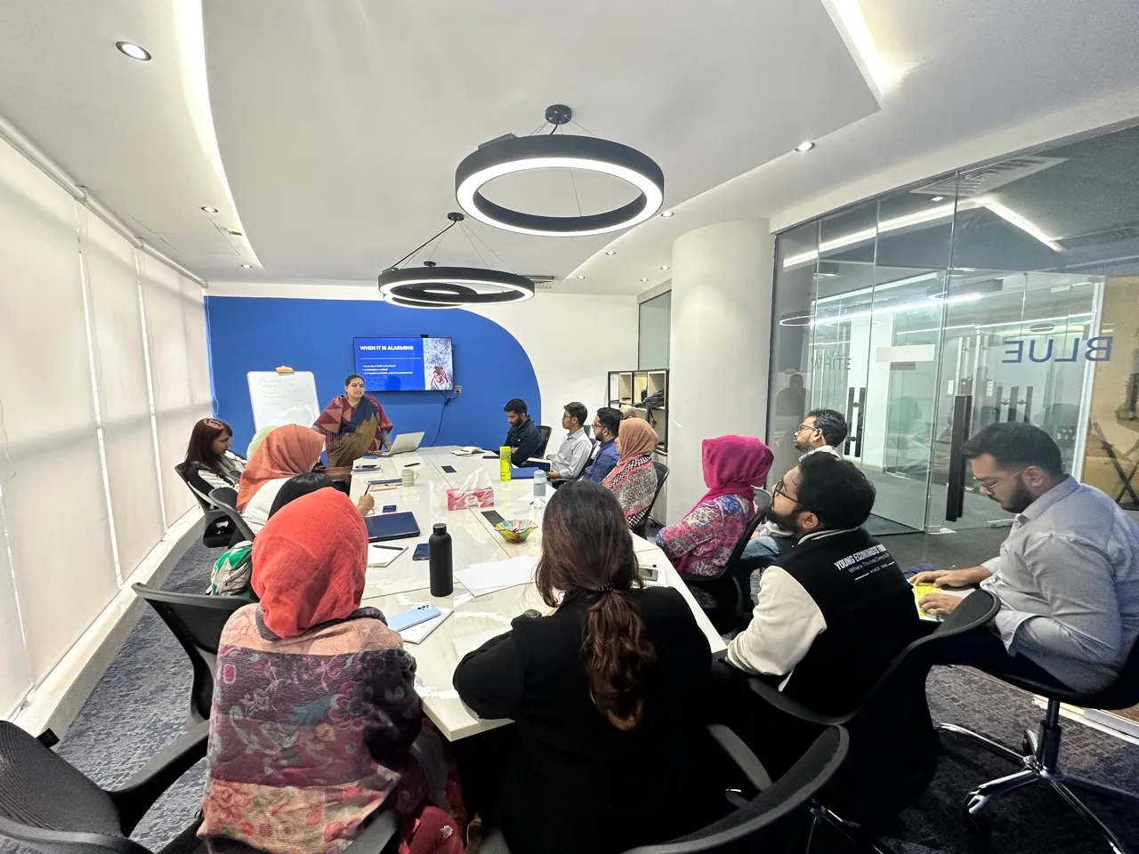 Chum Wellness psychologist leading an employee wellbeing workshop at LightCastle Partners