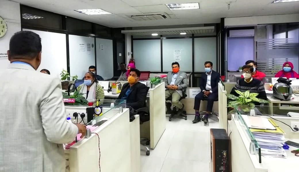 BRAC employees in a group discussion during a Chum Wellness employee wellbeing workshop