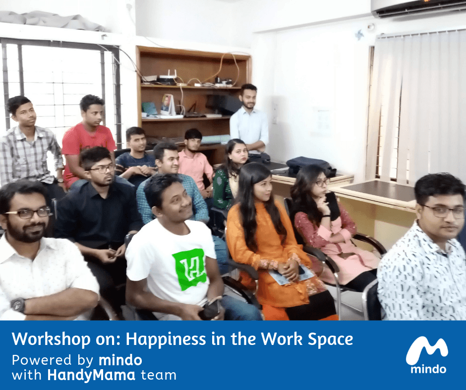 HandyMama employees collaborating during a Chum Wellness corporate wellbeing workshop