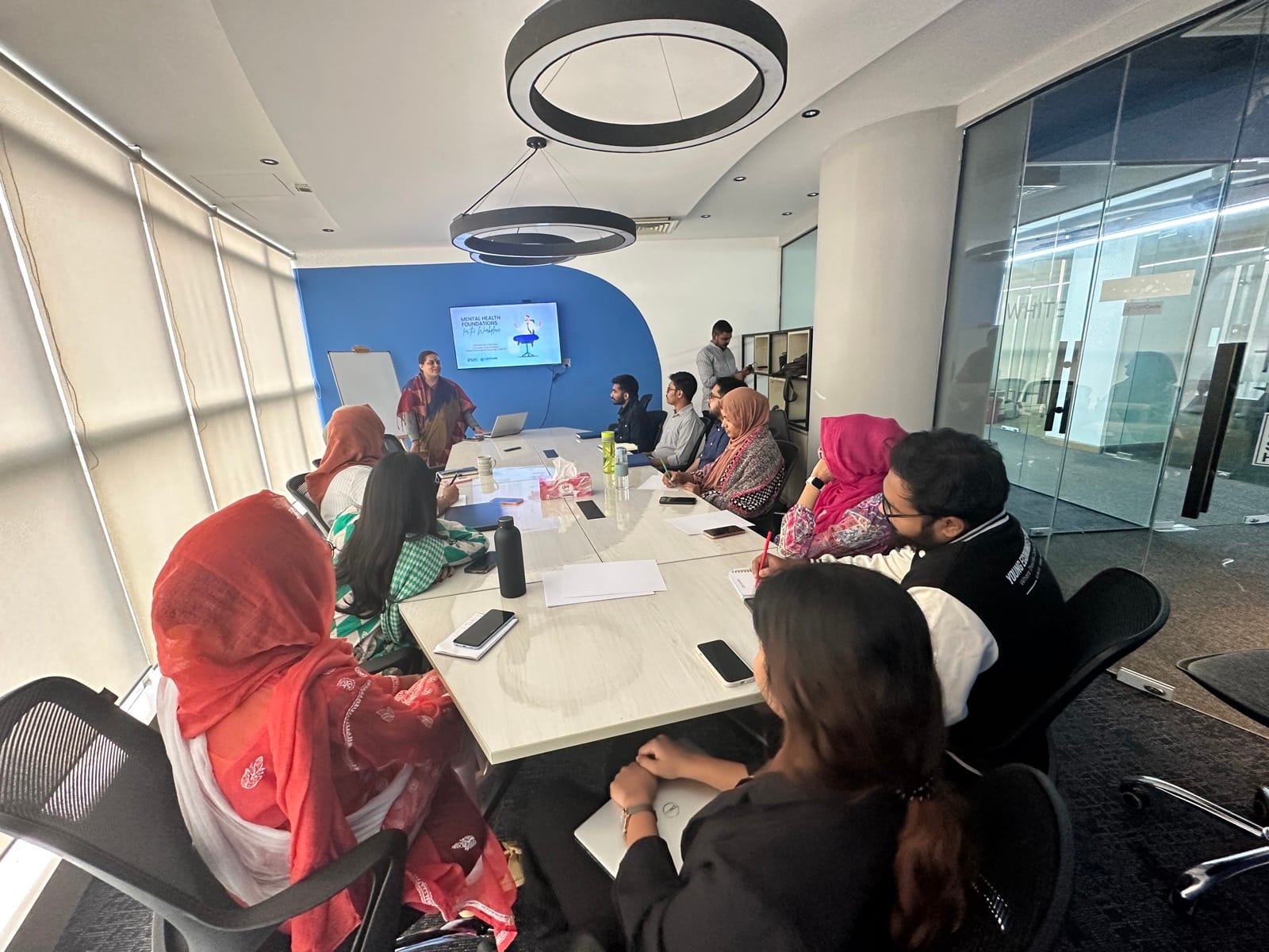 Chum Wellness facilitator leading a workplace wellbeing workshop at LightCastle Partners