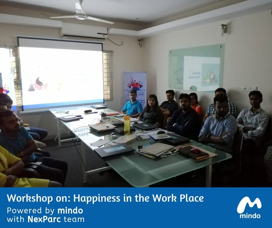 Chum Wellness therapist leading a resilience training workshop for Nexparc by NexKraft staff