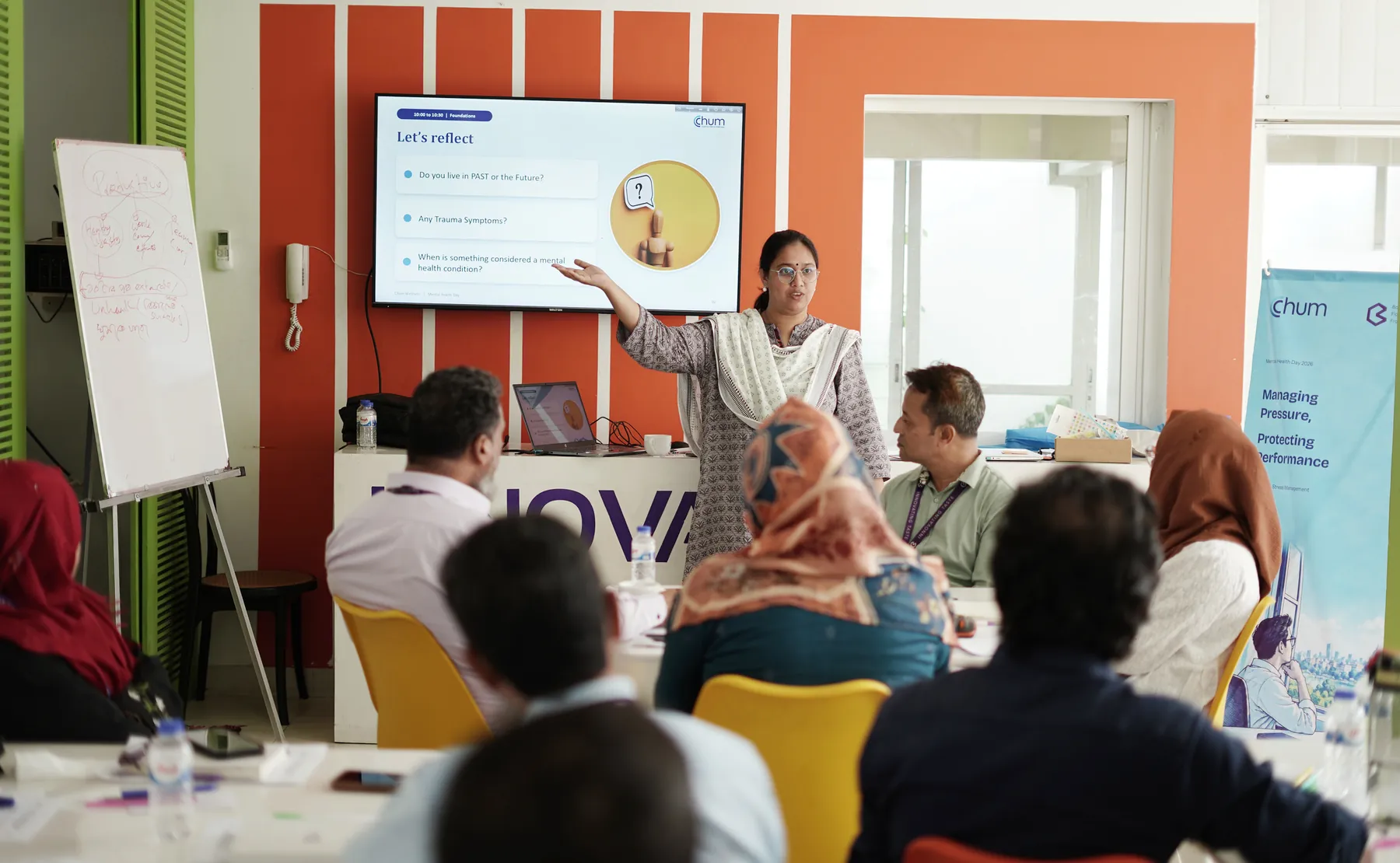 Psychologist Saima Akther Jui leading a session with the Banga management team